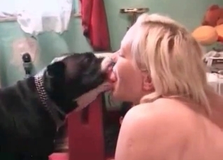 Hot lady is kissing a big hound
