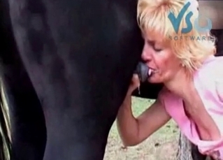 Passionate blonde is swallowing a stallion's cum