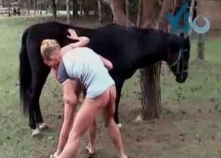 Passionate blonde is swallowing a stallion's cum