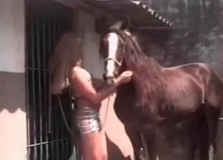 Lovely babe is playing dirty games with animals