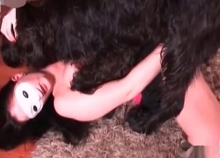 Awesome puppy is fucking with a whore wearing a mask
